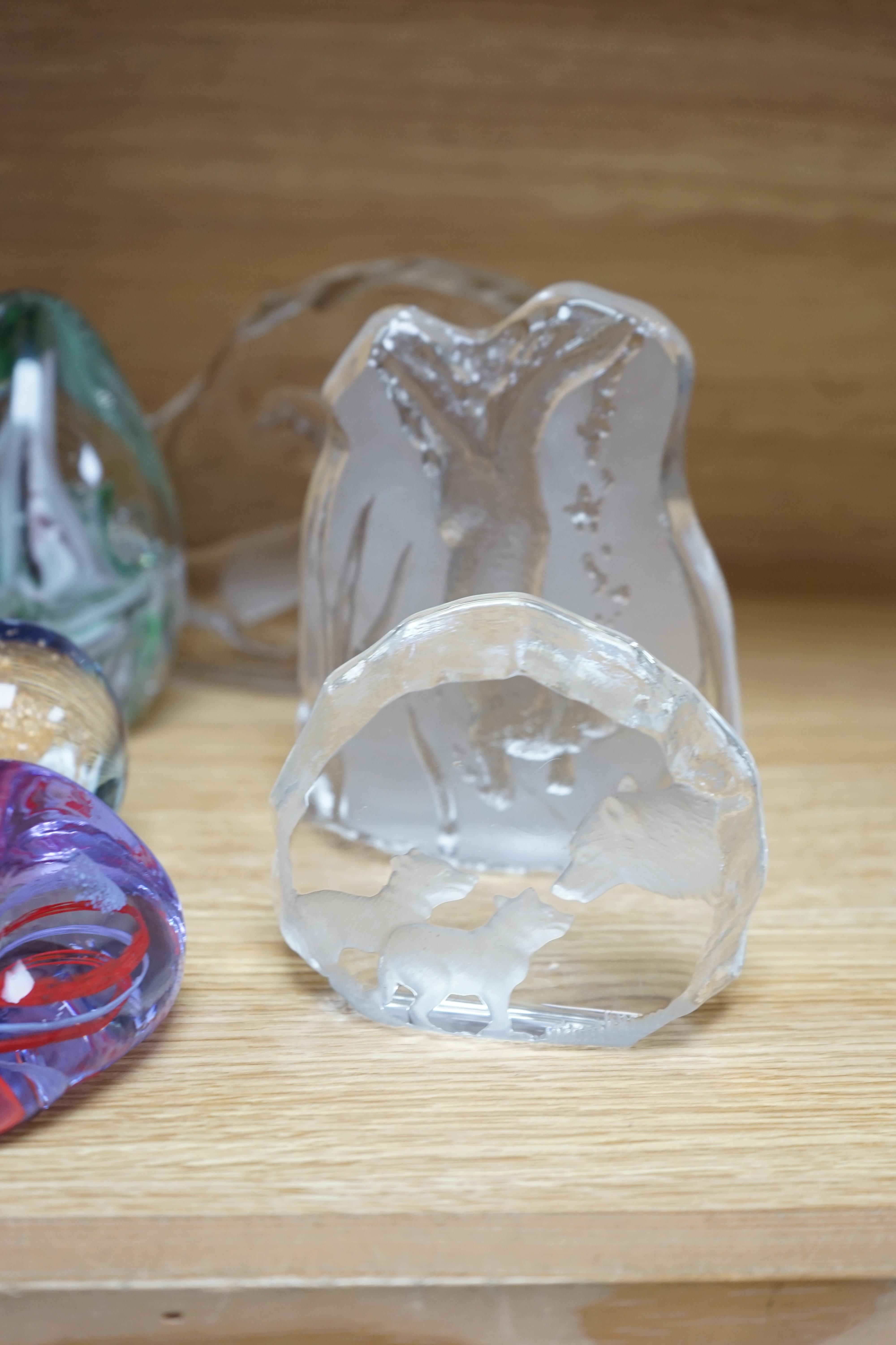 Twenty three glass paperweights, including five with silhouettes of animals, and others of unusual shape. Condition - good